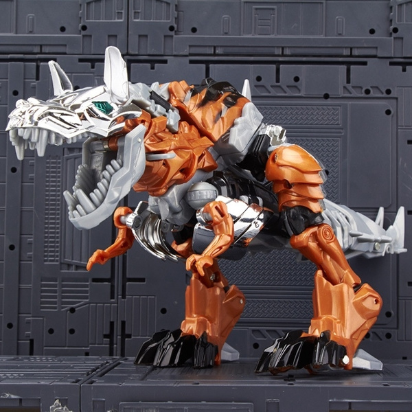 orange dinosaur transformer