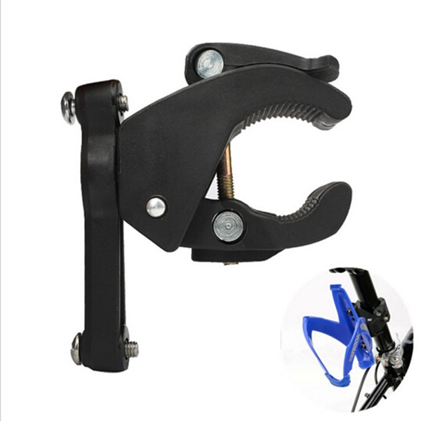 Clip on bottle holder for outlet bike