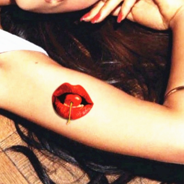 cherry lip tattoo