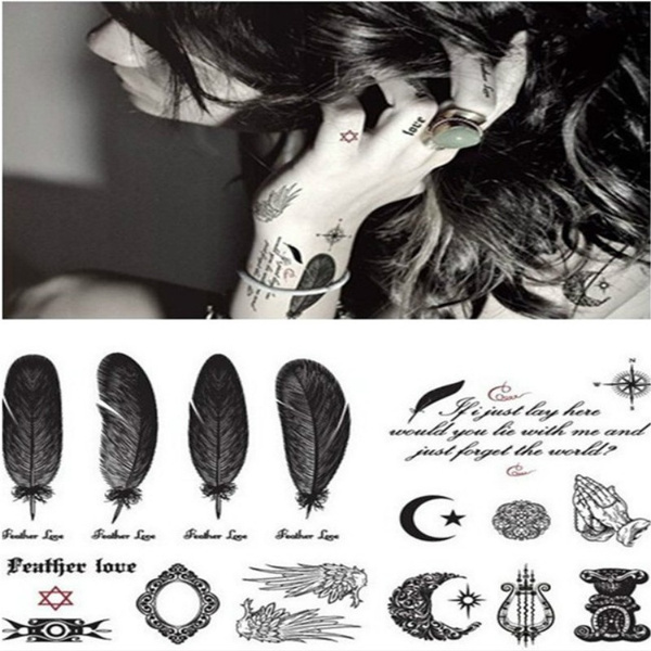 feather tattoos on wrist