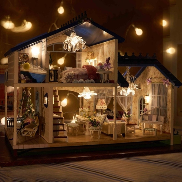 wooden dollhouse with lights