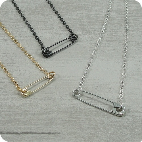 Safety pin clearance movement jewelry