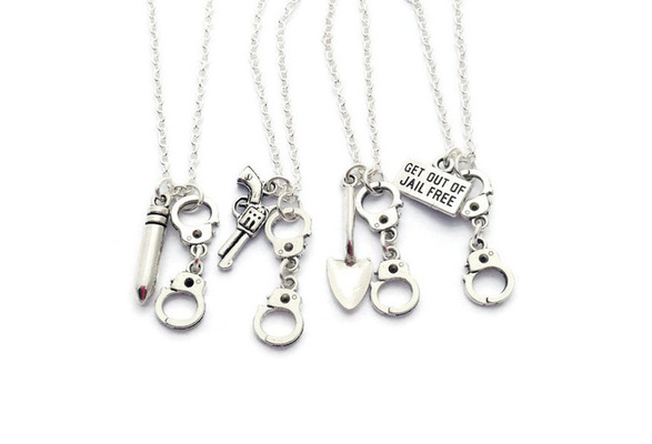 the Items are of High Quality Handcuff and Gun Necklace 