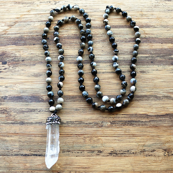 beaded necklace with crystal pendant