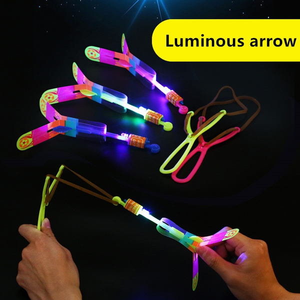 New Fashion LED Light Slingshot Flying Arrow Catapult Outdoor Toy Kids Gift 