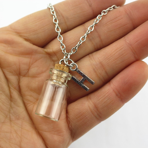 A necklace that 2024 holds ashes