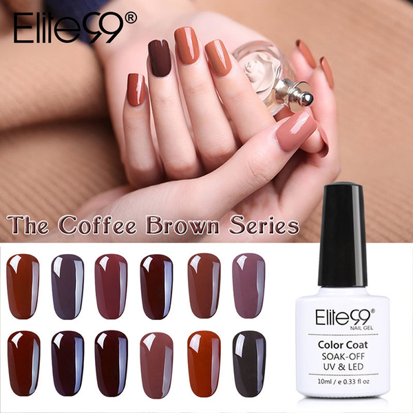 Manicure In Brown Shades Of Nail Polish Designed In The Form Of Chains With  Rhinestones On A Woman's Hand. Stock Photo, Picture and Royalty Free Image.  Image 60368825.