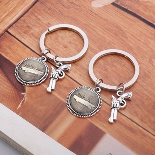 1Pair Movie Accessories Thelma and Louise Pistol Pendant Keychain