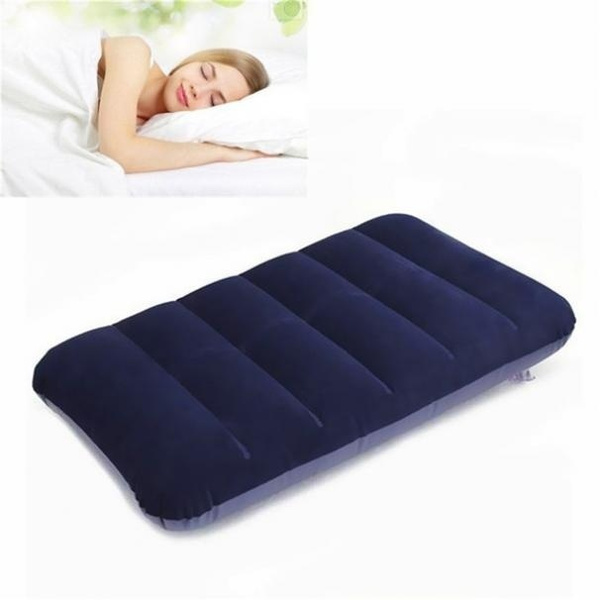 Inflatable bed pillow outlet for travel