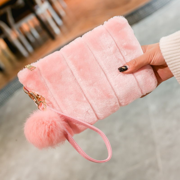 pink fluffy clutch bag