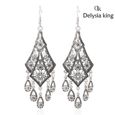 DELYSIA KING Bohemian Retro Hollow Carved Flower Long Dangle Earrings Ethnic Vintage Water Drop Tassel Earrings Indian Jewelry