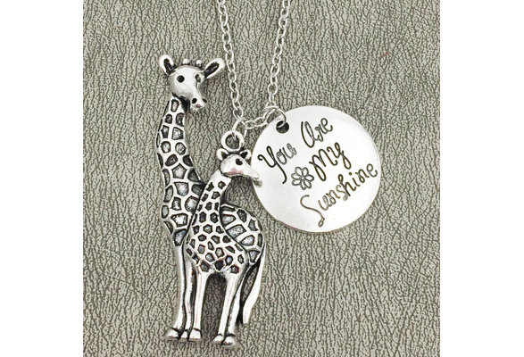 silvertone mother and baby giraffe pendant
