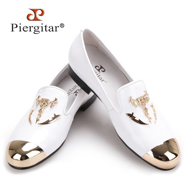 white loafers gold buckle