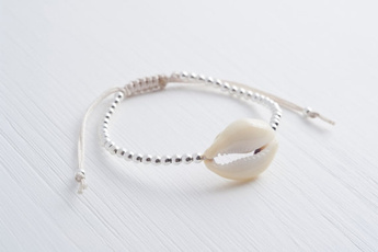Jewelry, cowrieshellbracelet, braided bracelet, silver plated