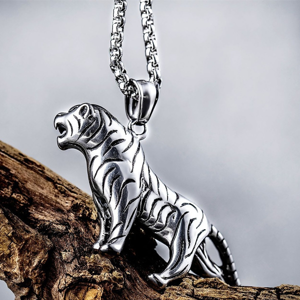 String necklace, metal pendant, tiger head