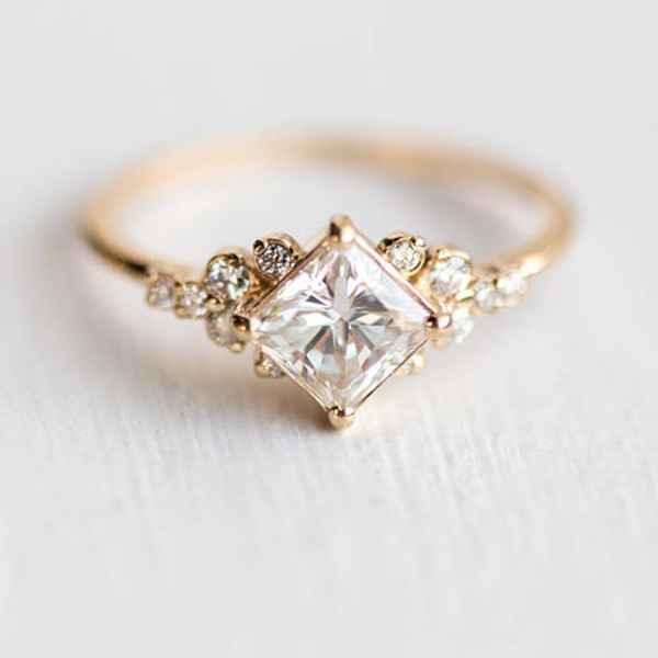 Rotated princess cut 2025 engagement ring