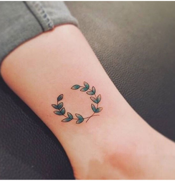 Green Leaf Tattoo On Rib - Tattoos Designs