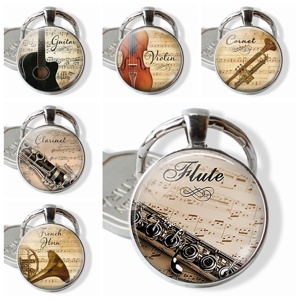 Musical Instruments and Music Keyring. French Horn, Guitar