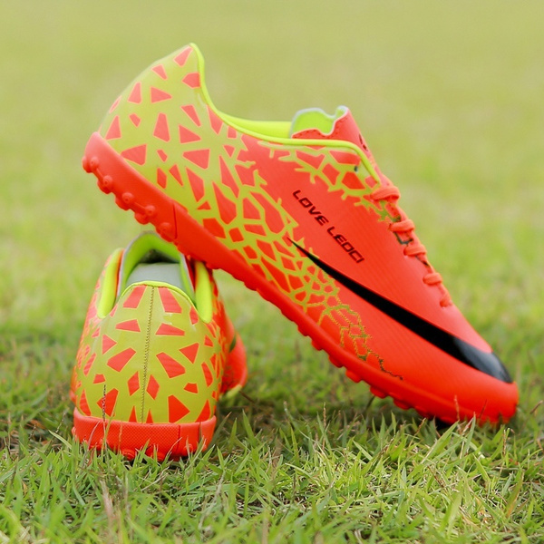 indoor soccer shoes on grass