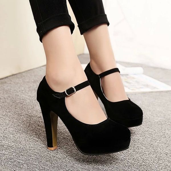 black pumps with buckle