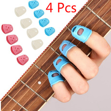 4pcs Guitar Plectrum Silicone Celluloid Thumb Picks Finger Picks Musical Instrument Accessories (Random color)