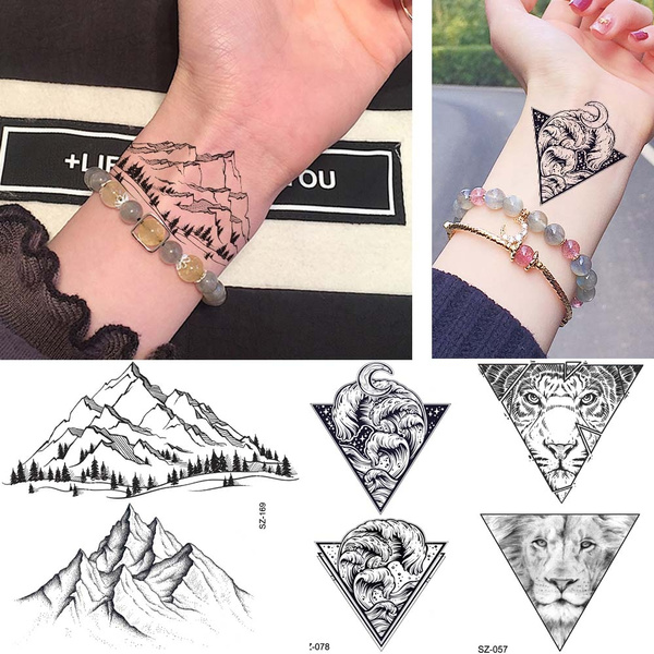 Geometric Wrist Tattoos For Women | Wrist tattoos for women, Cute tattoos  on wrist, Triangle tattoo