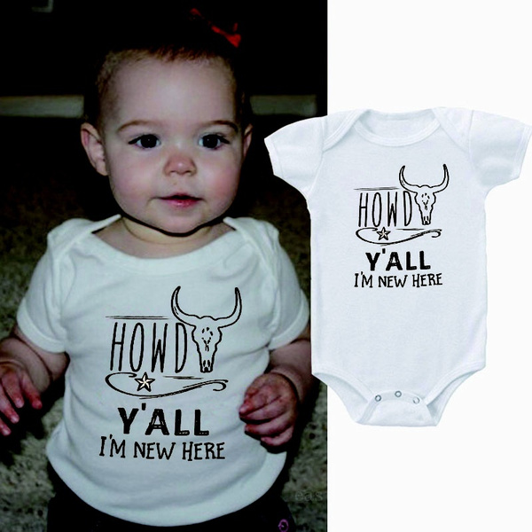 white jumpsuit for baby shower