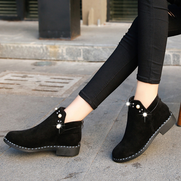 bota aberta no calcanhar