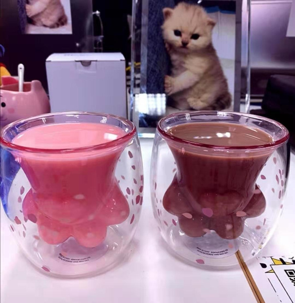 Cat deals paw glass