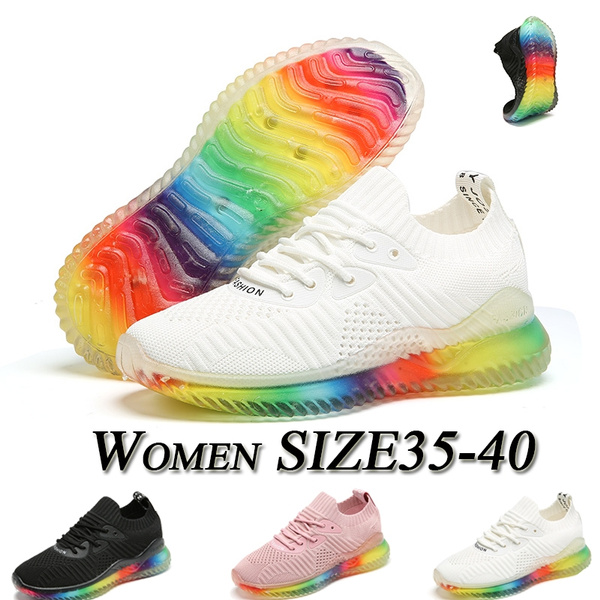 white sneakers with rainbow soles