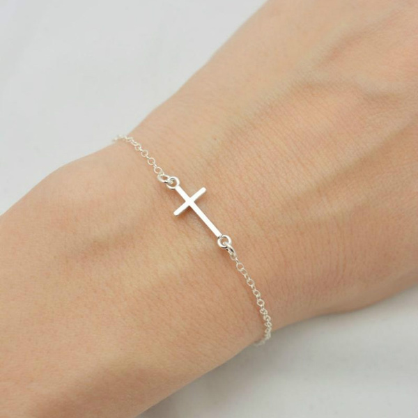 Silver cross deals bangle