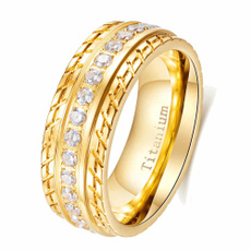 Steel, yellow gold, zirocnring, wedding ring