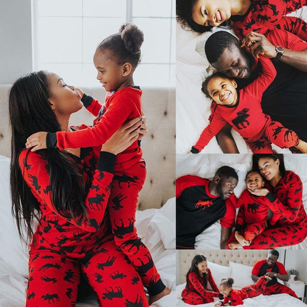 mom dad and baby matching christmas outfits