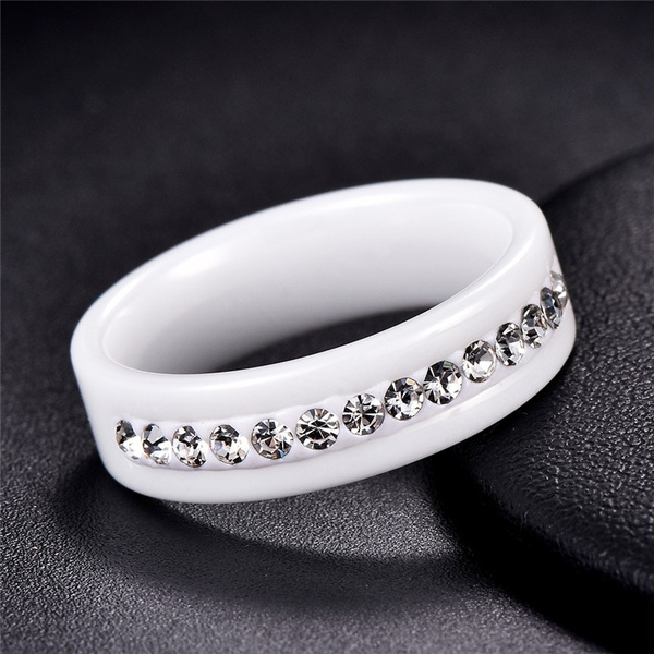 white ceramic rings with diamonds