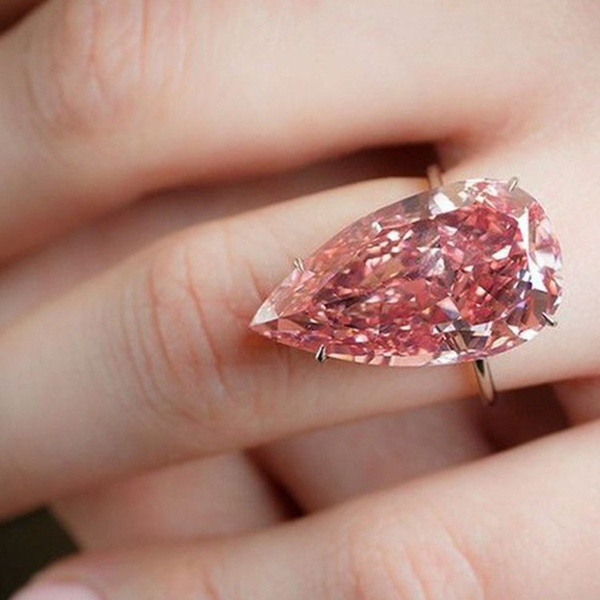 pink diamond ring on hand