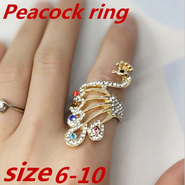 Featuring peacock ring handcrafted in gold and adorned with multy colour  stone and kundan … | Gold jewelry fashion, Gold bangles design, Antique  gold jewelry indian