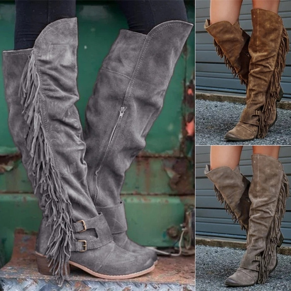 long boots with tassels