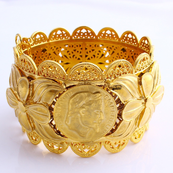 Big gold hot sale bangles images