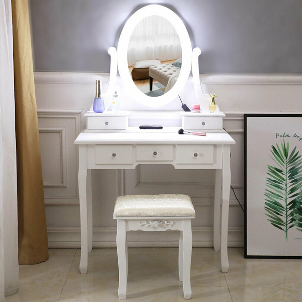 desk with mirror and lights