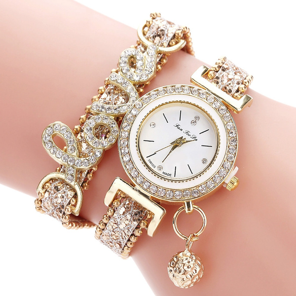 Gucci Charm Bracelet Watch with a Diamond. Worn less... - Depop