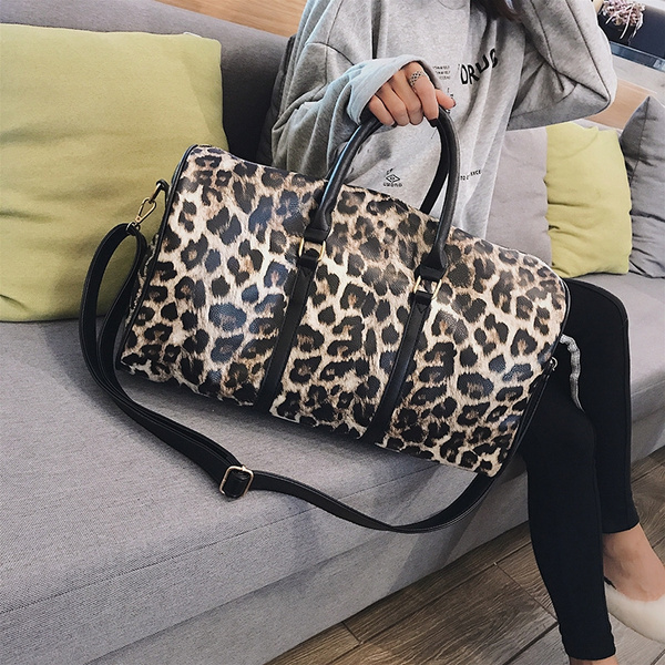 animal print overnight bolsa