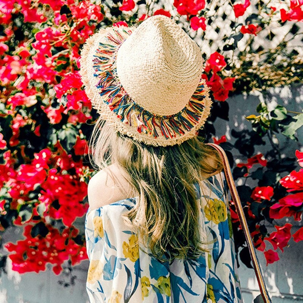 straw hat with tassels