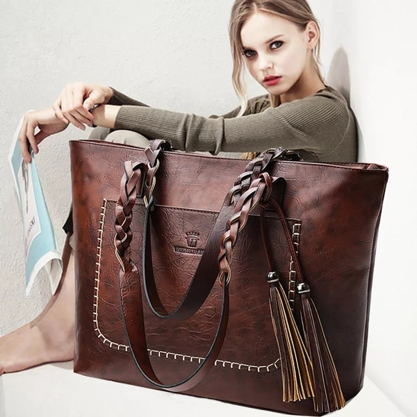 leather bolsa with tassels