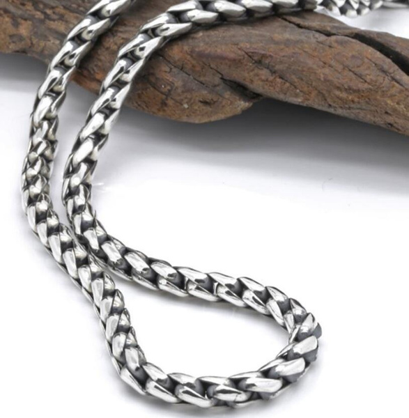 Thick silver chain deals with cross