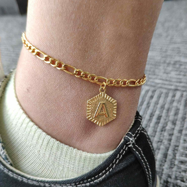 Gold anklet deals with letter