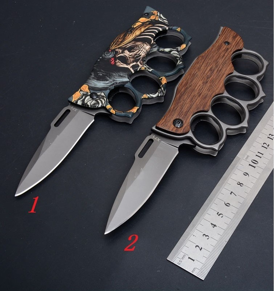 brass knuckles folding knife