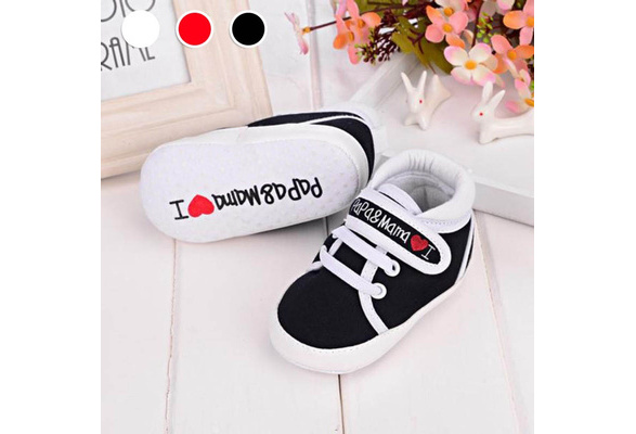 white canvas baby shoes