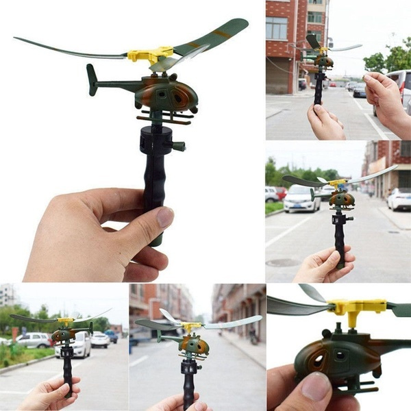 string helicopter toy