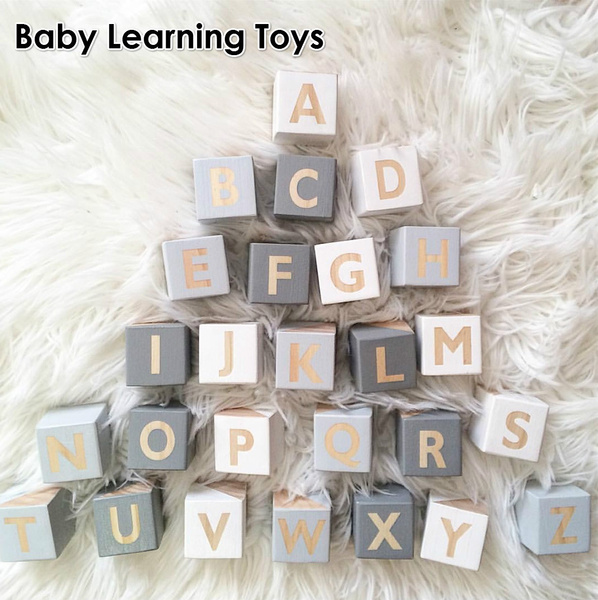 neutral wooden alphabet blocks