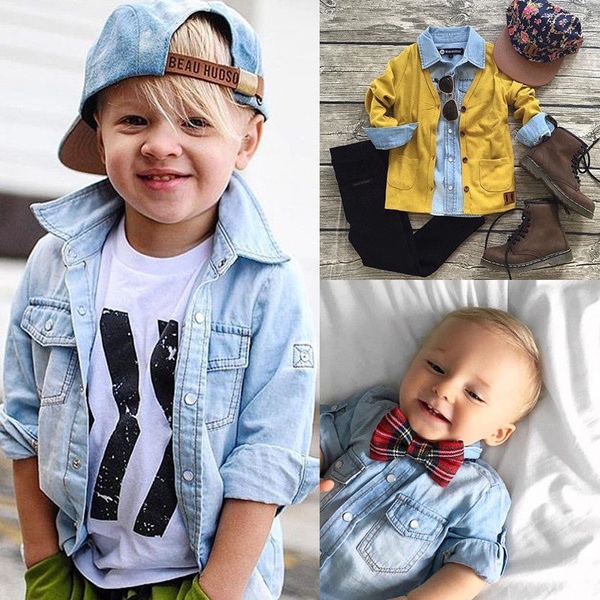 Toddler Boy In Denim Shirt And Beige Free Stock Photo and Image 478623696
